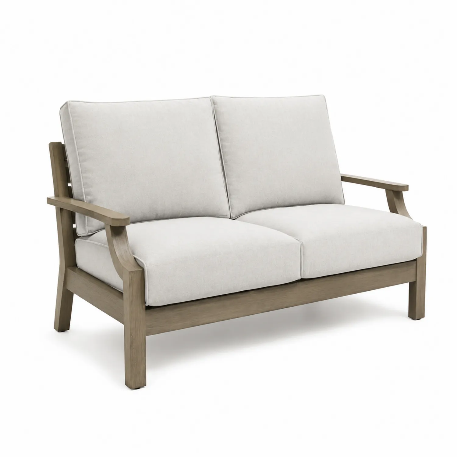 Sofa z drewnianą ramą i białymi poduszkami