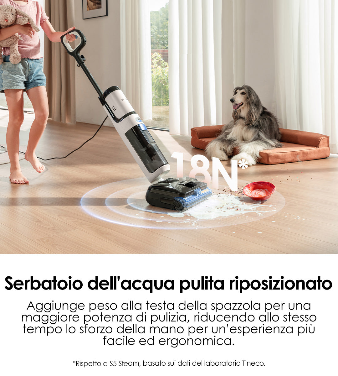 A child uses a cleaning device on a wooden floor, with a dog nearby and a spilled bowl. Bright, airy room with large windows.