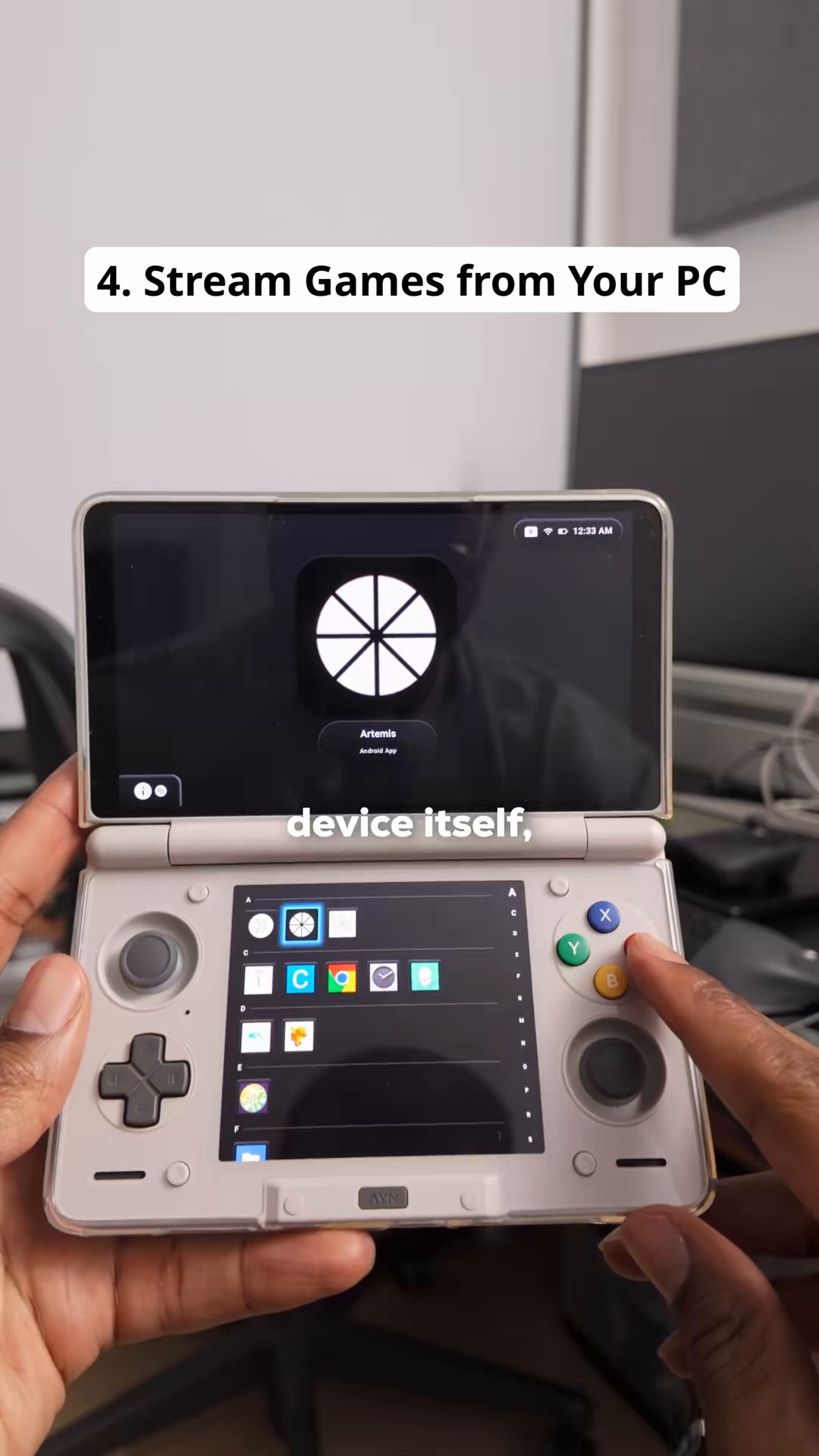 Dual-screen handheld showing play on both displays