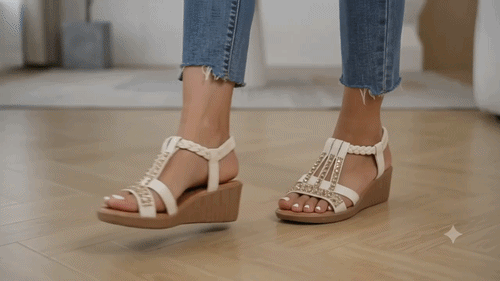 PLACEHOLDER: hero image of a woman wearing sparkly rhinestone wedge sandals with a summer dress