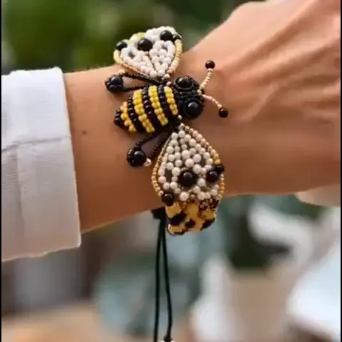 bee beaded bracelet worn on wrist