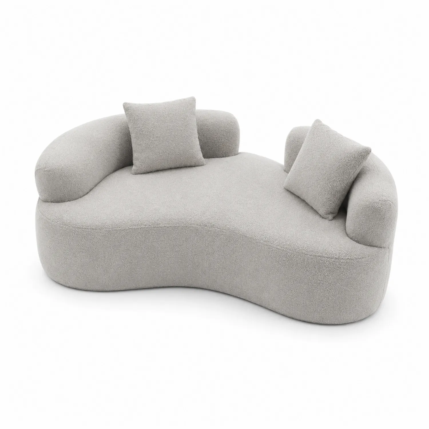 Sofá curvo de tela bouclé gris con cojines