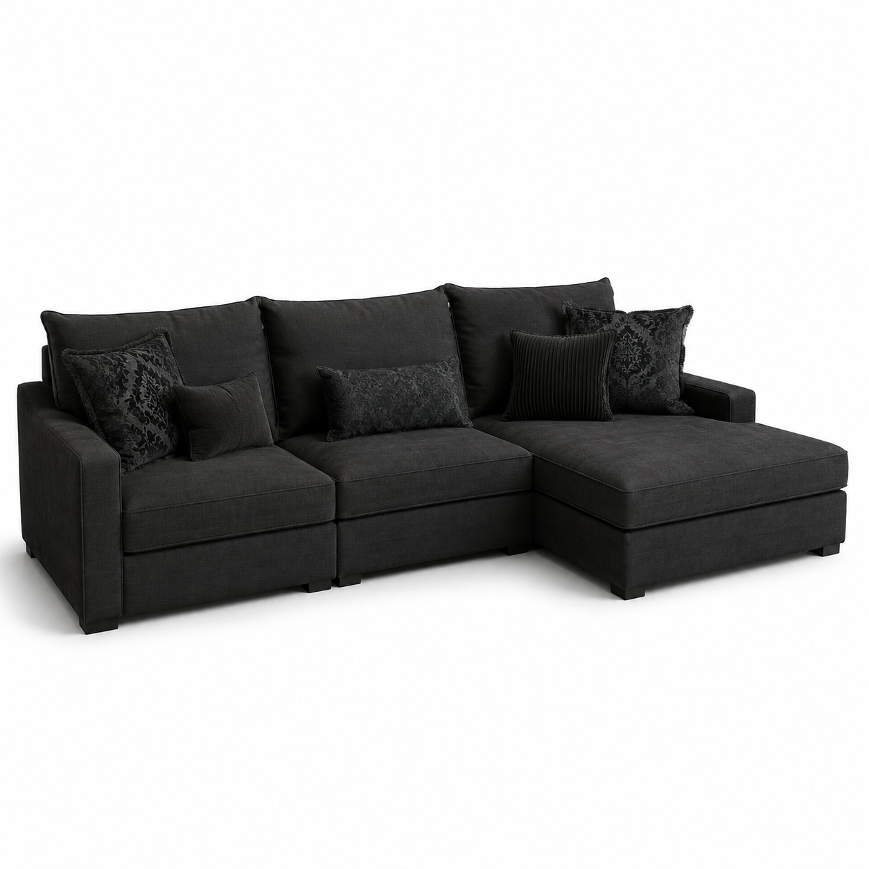 Dunkles Modulsofa mit rechter Chaiselongue und ornamentalen Kissen