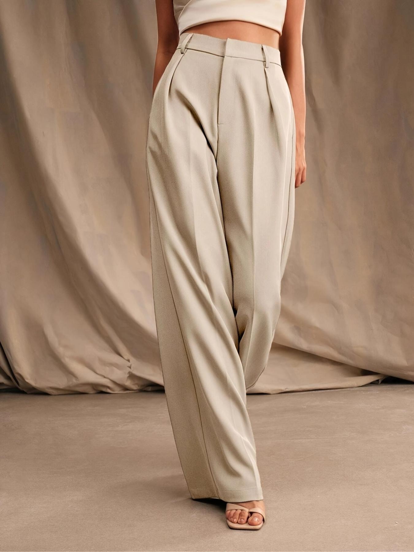 Pantalón de Mujer de Tiro Alto y Pierna Amplia — Corte Holgado con Pliegues en la Cintura, Desde $65.57 MXN por Pieza