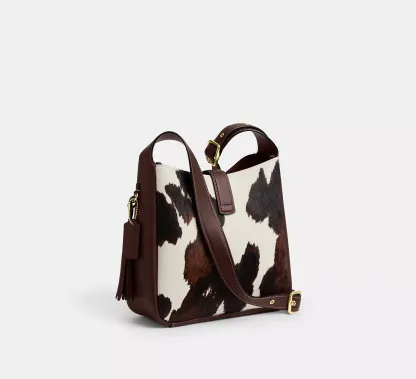  Hadley Convertible Crossbody Bag With Cow Print And Tassel