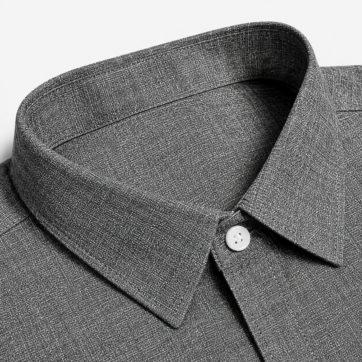 Collar and button placket detail on textured short-sleeve shirt