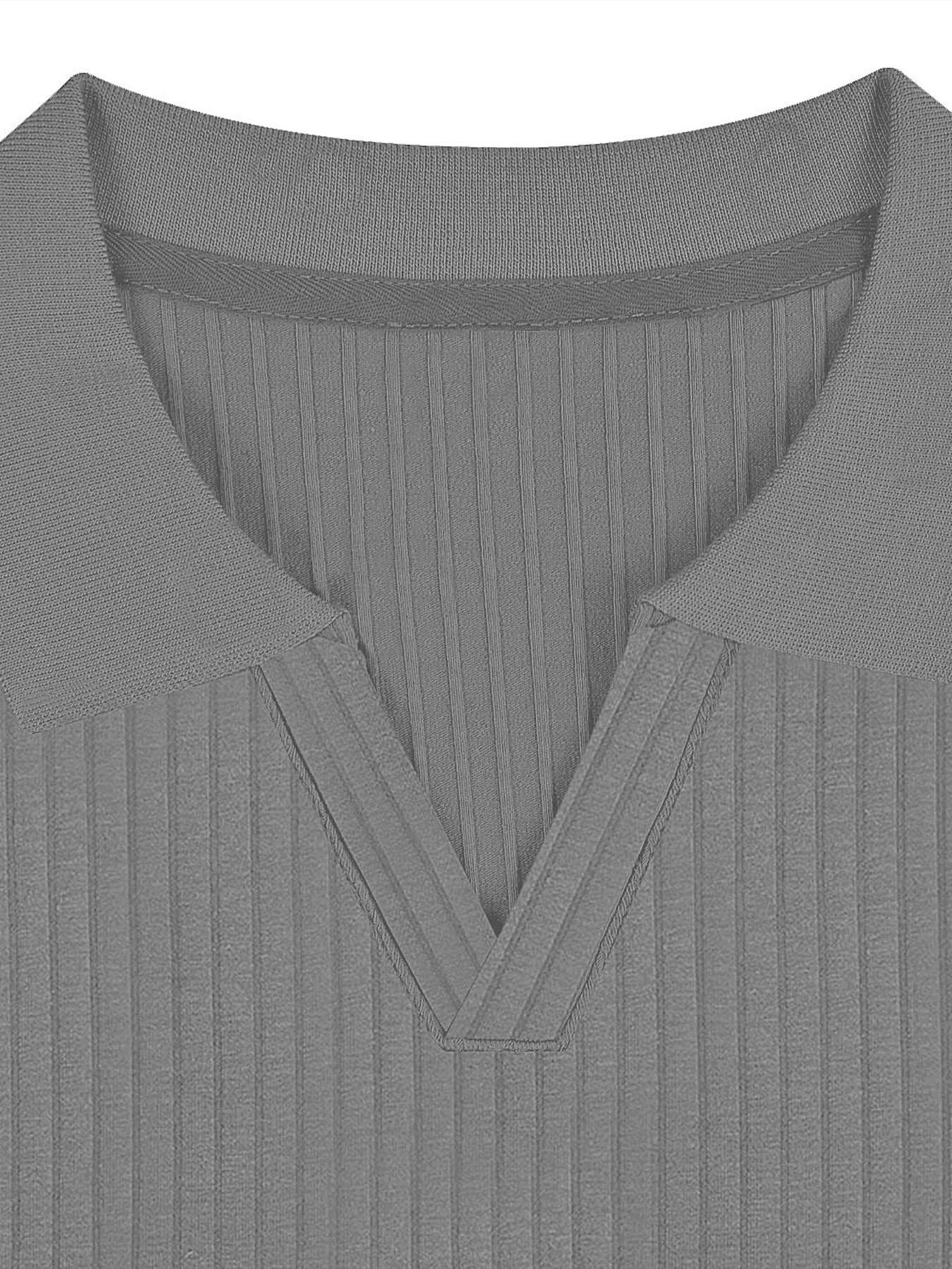 Close up of the ribbed knit polo open collar and V placket