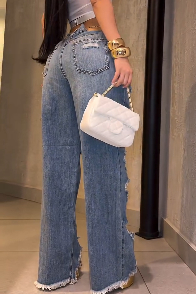 Distressed Washed Women's Jeans With Raw Hem Details