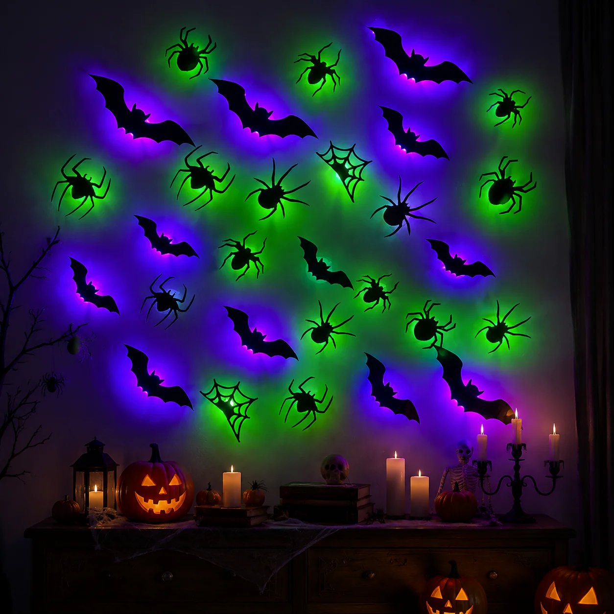 Lighted bat decorations arranged on a Halloween wall