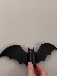 Lighted Halloween bat wall decorations in use