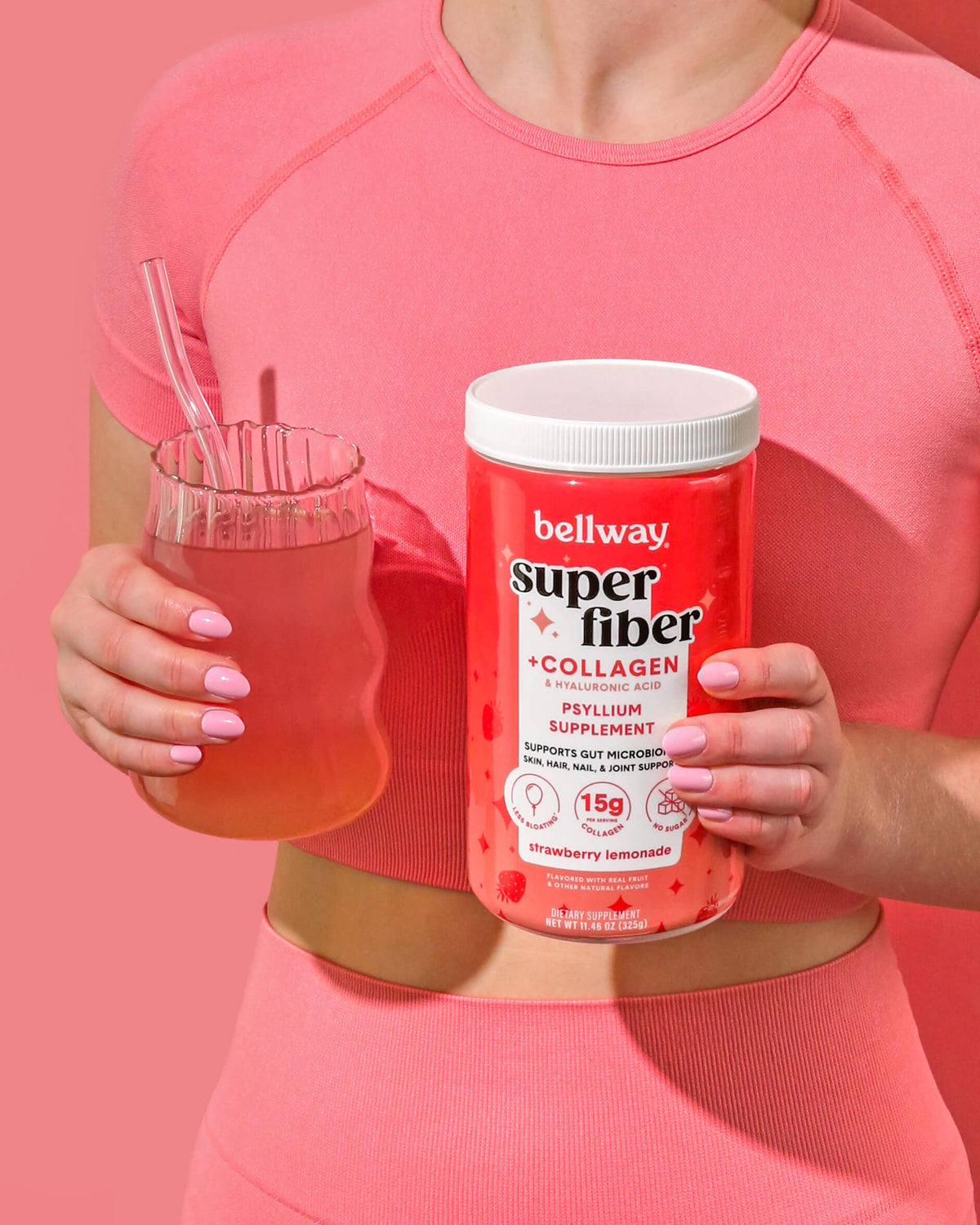 A glass of Bellway Super Fiber beside fresh fruit