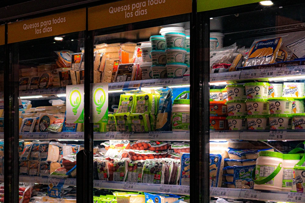 Supermarket refrigerated cases representing year-round commercial refrigerant demand