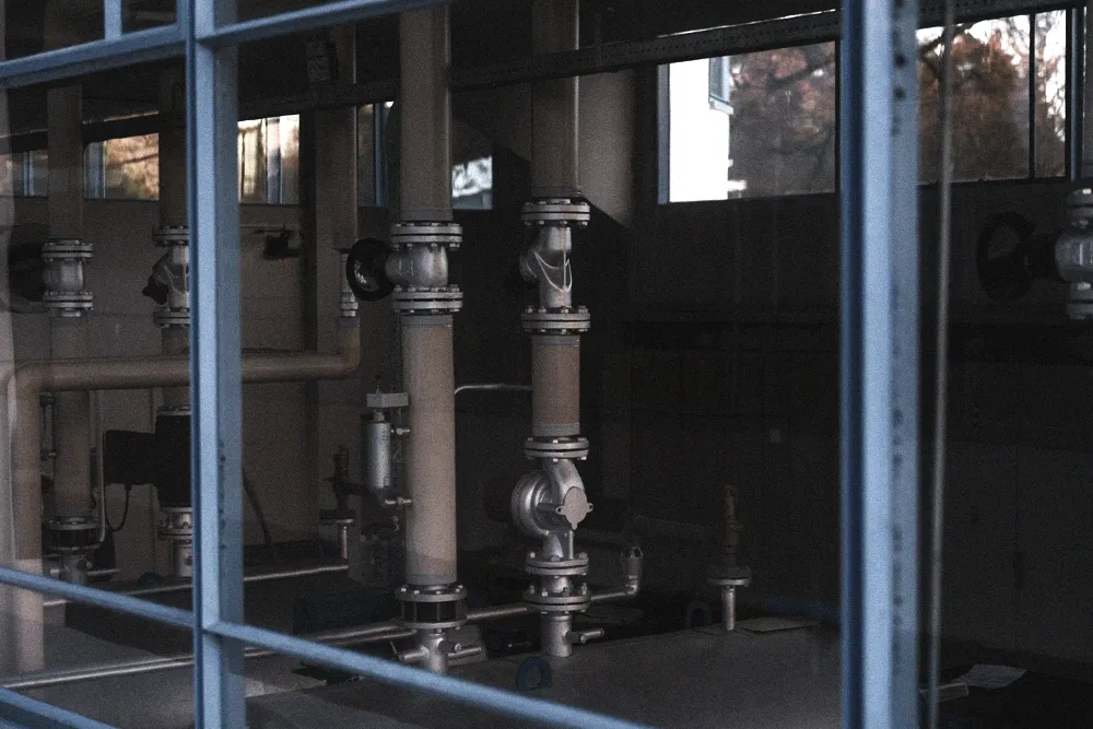 Laboratory professional testing samples to verify reclaimed refrigerant purity