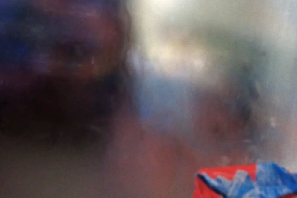 Condensation covering a glass door on a refrigerated store case