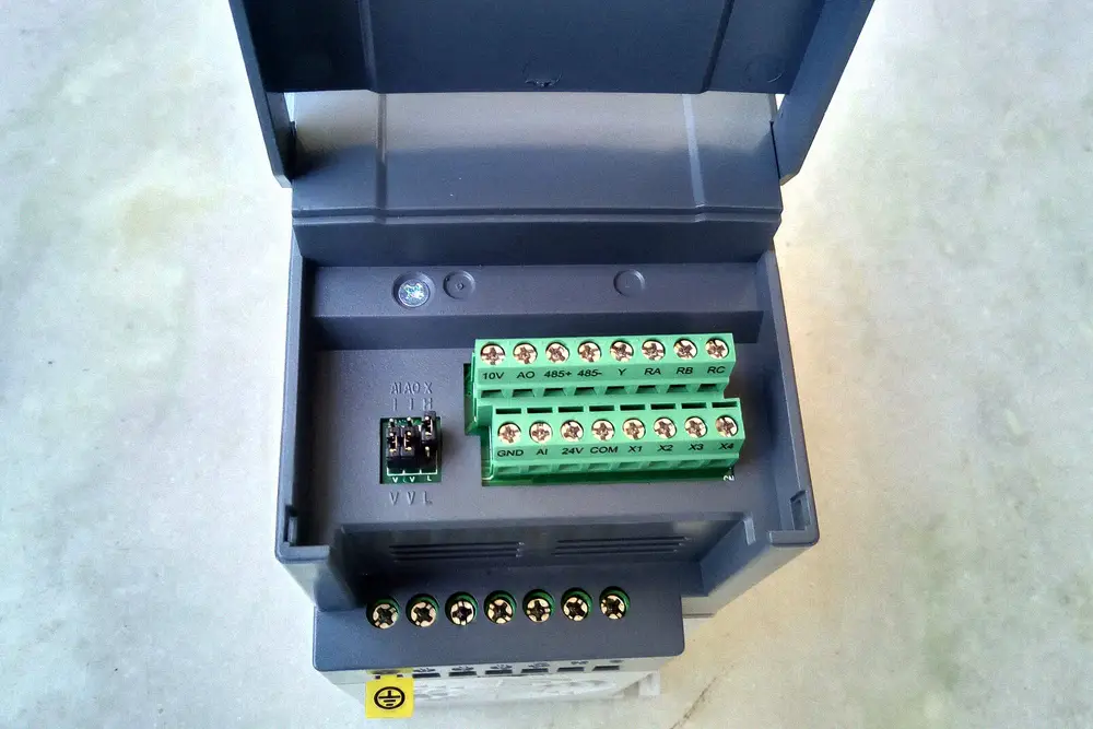 Variable-frequency drive and electrical connections used to control motor speed