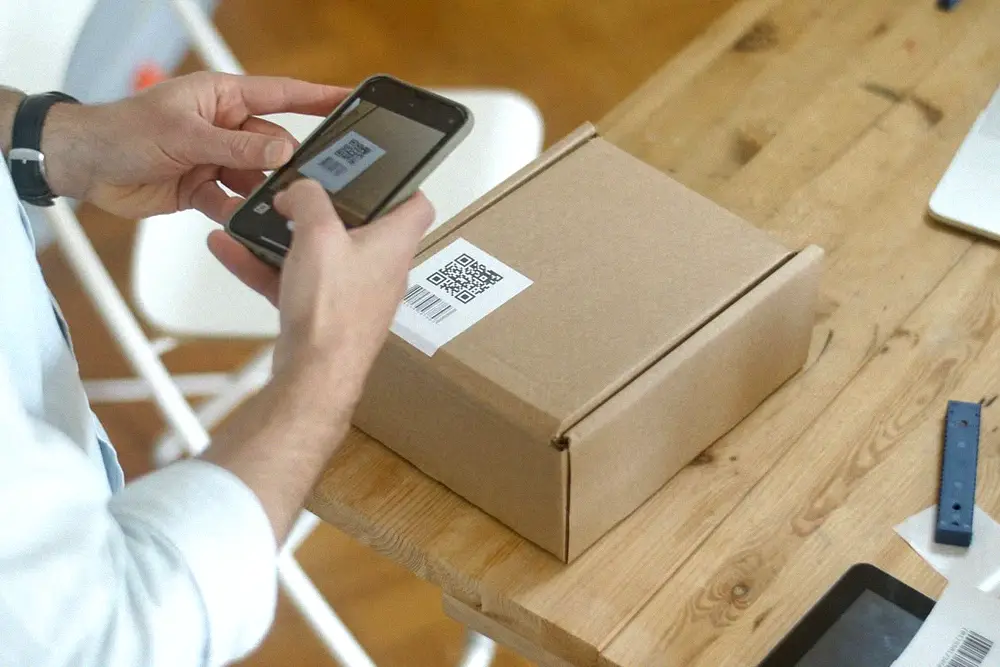 Customer scanning a product QR code before purchasing the correct air conditioner refrigerant