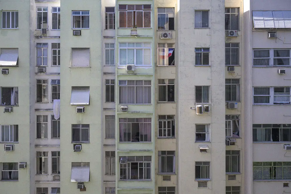 Apartment building facade with multiple window air-conditioning units