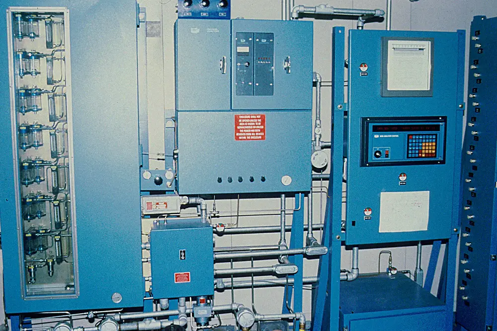 Laboratory gas chromatography system representing analytical verification of chemical composition.