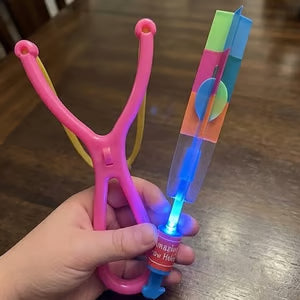 🚀 LED Flying Copter Slingshot Toy – Light-Up Spinning Launcher for Kids & Family Fun