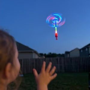 🚀 LED Flying Copter Slingshot Toy – Light-Up Spinning Launcher for Kids & Family Fun