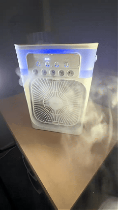 Portable five-nozzle mist cooling fan in operation