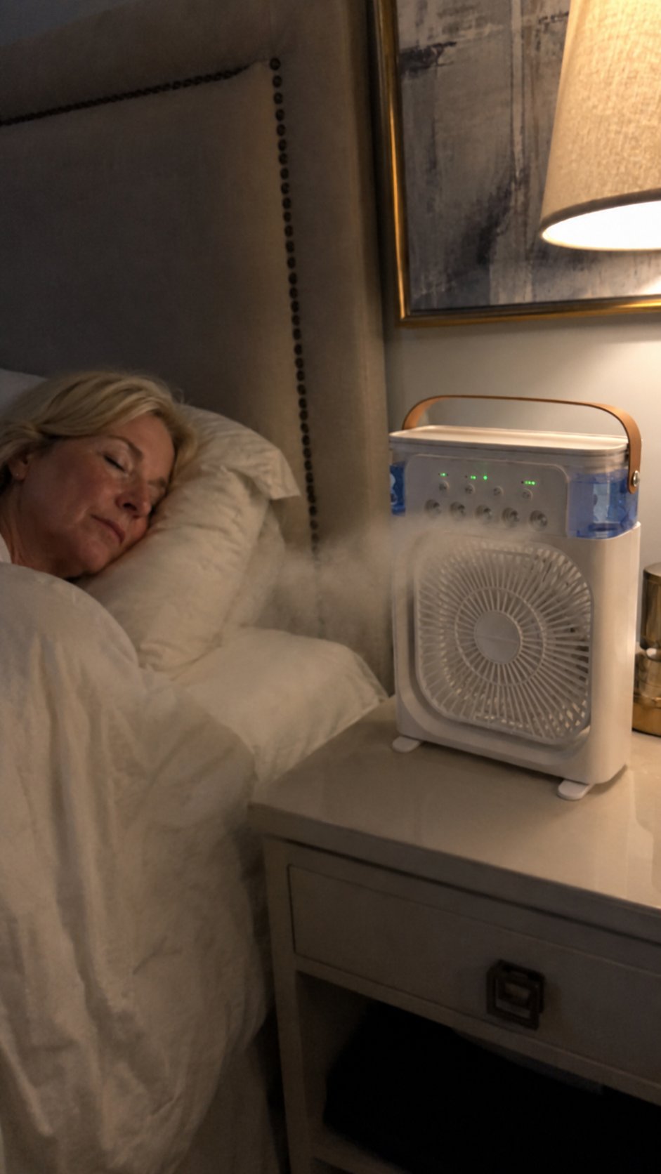 Customer using portable mist fan beside a bed