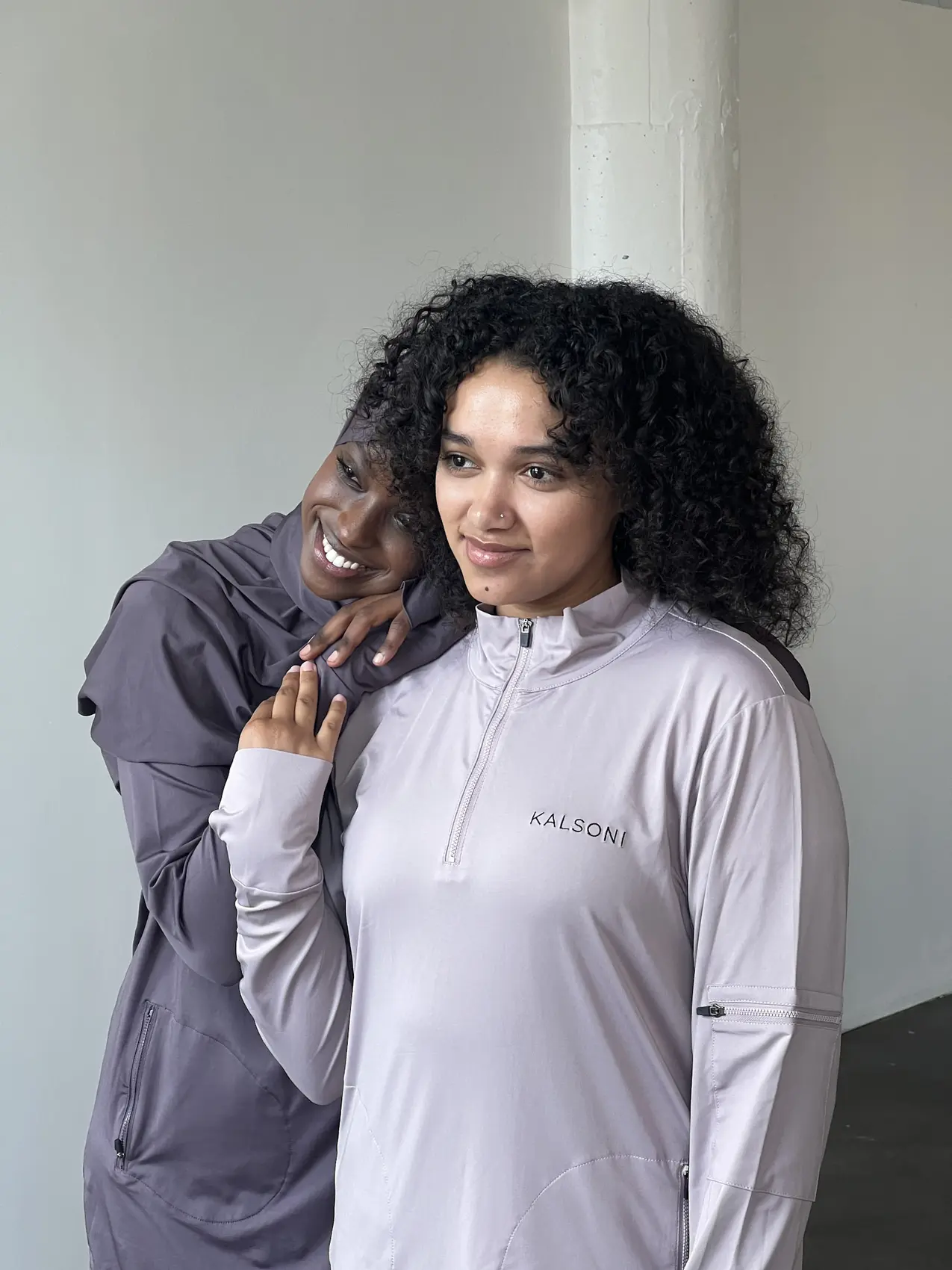 Two women wearing Kalsoni performance apparel together