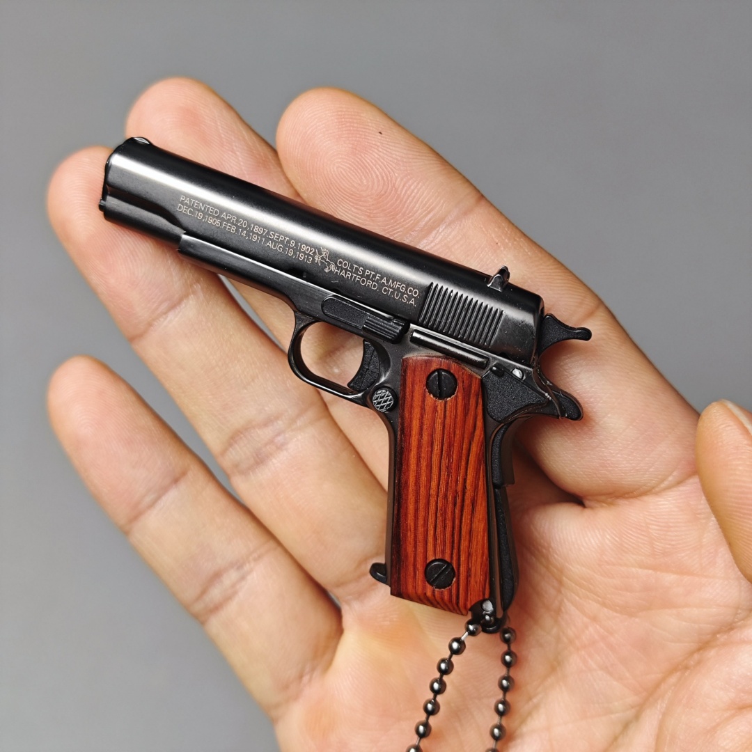 Pistol-Shaped Carry Clip Keychain