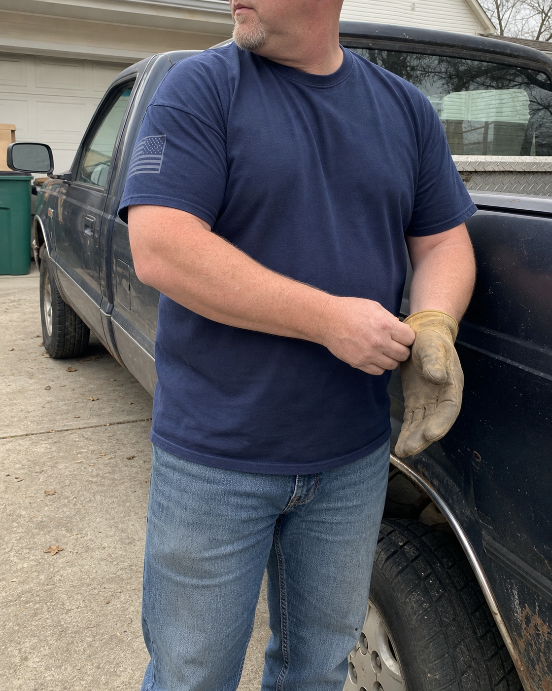 AI style inspiration wearing Navy tactical crewneck work shirt beside a pickup truck