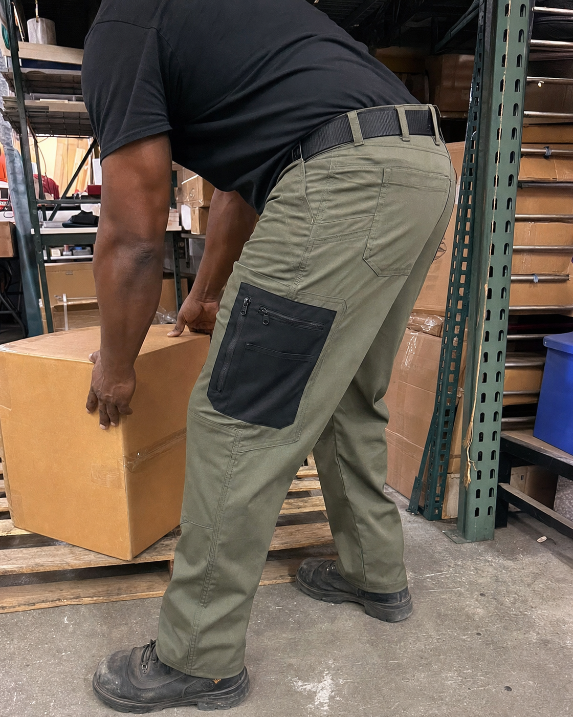 AI style inspiration wearing Olive Drab multi-pocket tactical cargo pants in a warehouse
