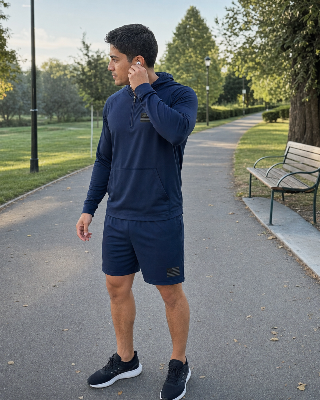 AI style inspiration wearing Navy quarter-zip hoodie and matching shorts at a neighborhood park
