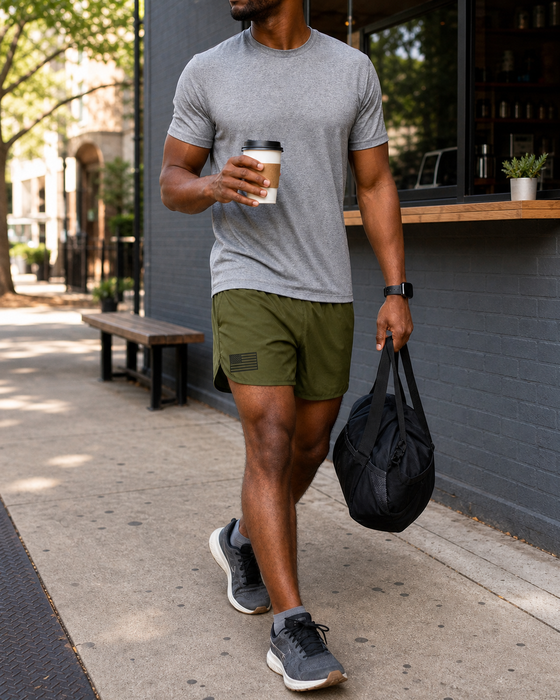 AI style inspiration wearing Olive performance running shorts during a post-workout coffee errand