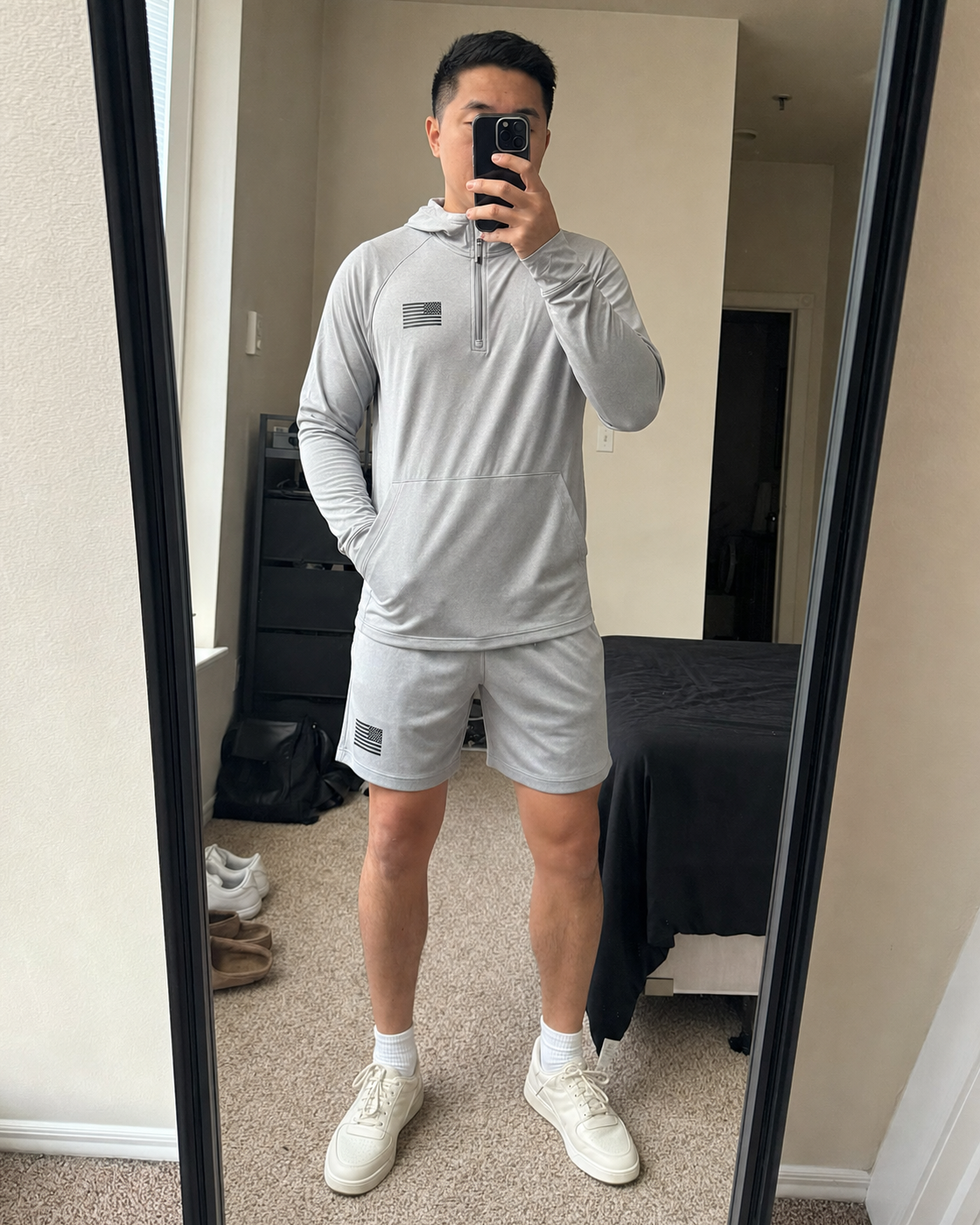 AI style inspiration mirror fit wearing Light Gray quarter-zip hoodie and matching shorts