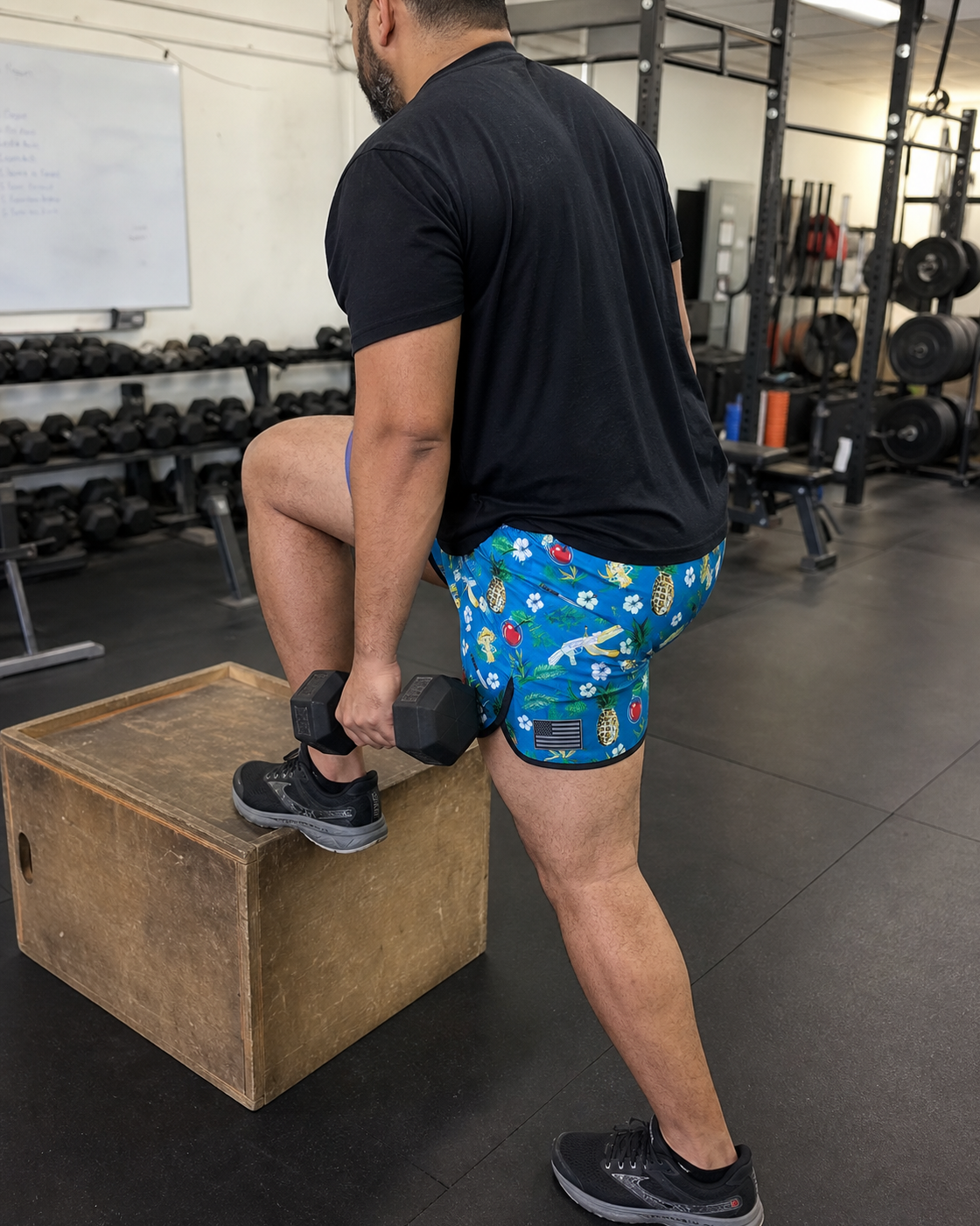 AI style inspiration wearing Tropical Freedom Blue performance running shorts during gym training