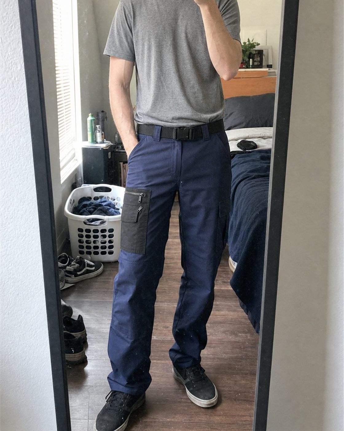 AI style inspiration mirror fit wearing Navy Blue multi-pocket tactical cargo pants at home