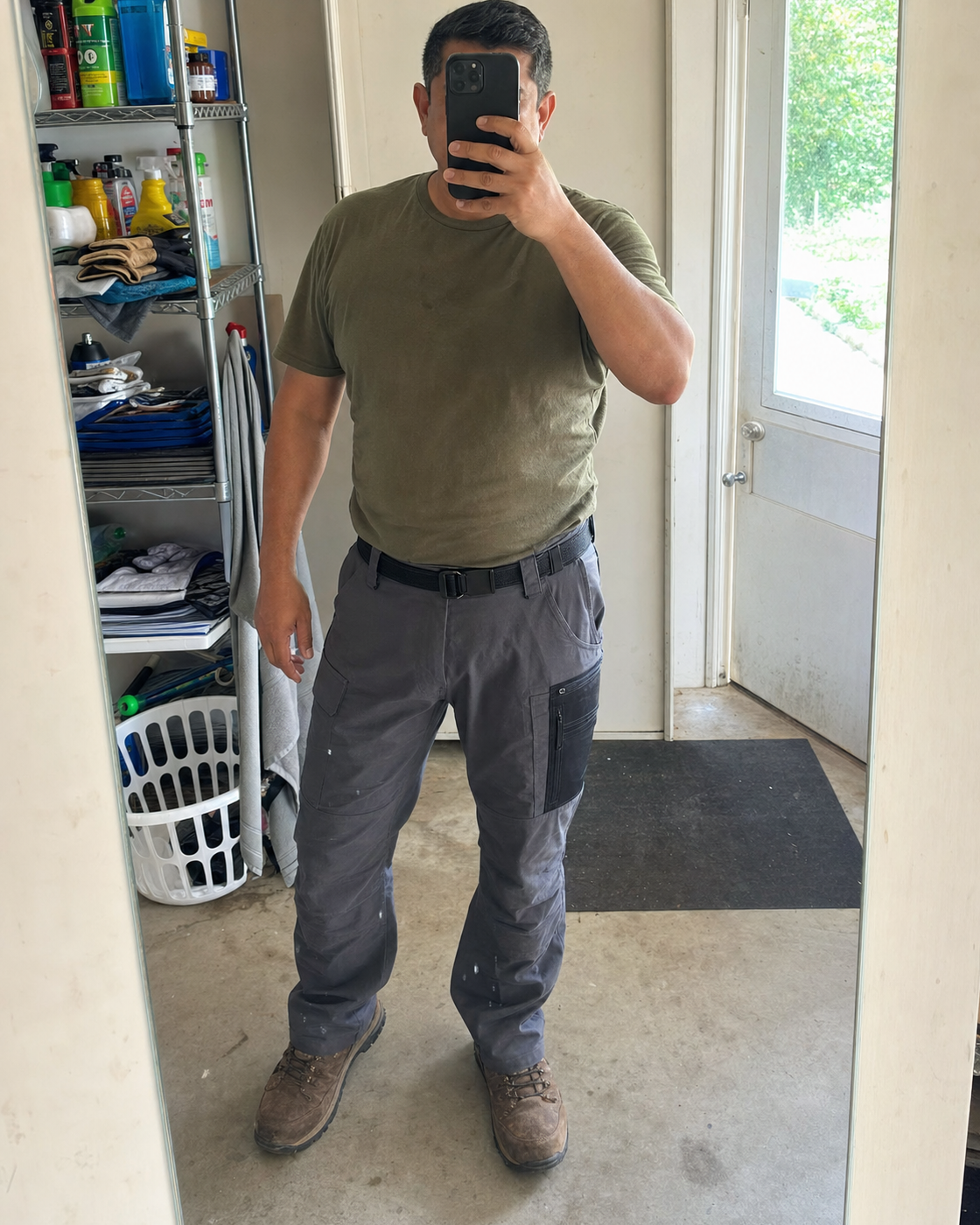 AI style inspiration mirror fit wearing Carbon Gray multi-pocket tactical cargo pants in a garage