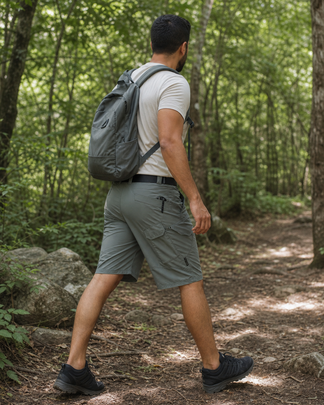 AI style inspiration wearing Green tactical cargo shorts on a trail