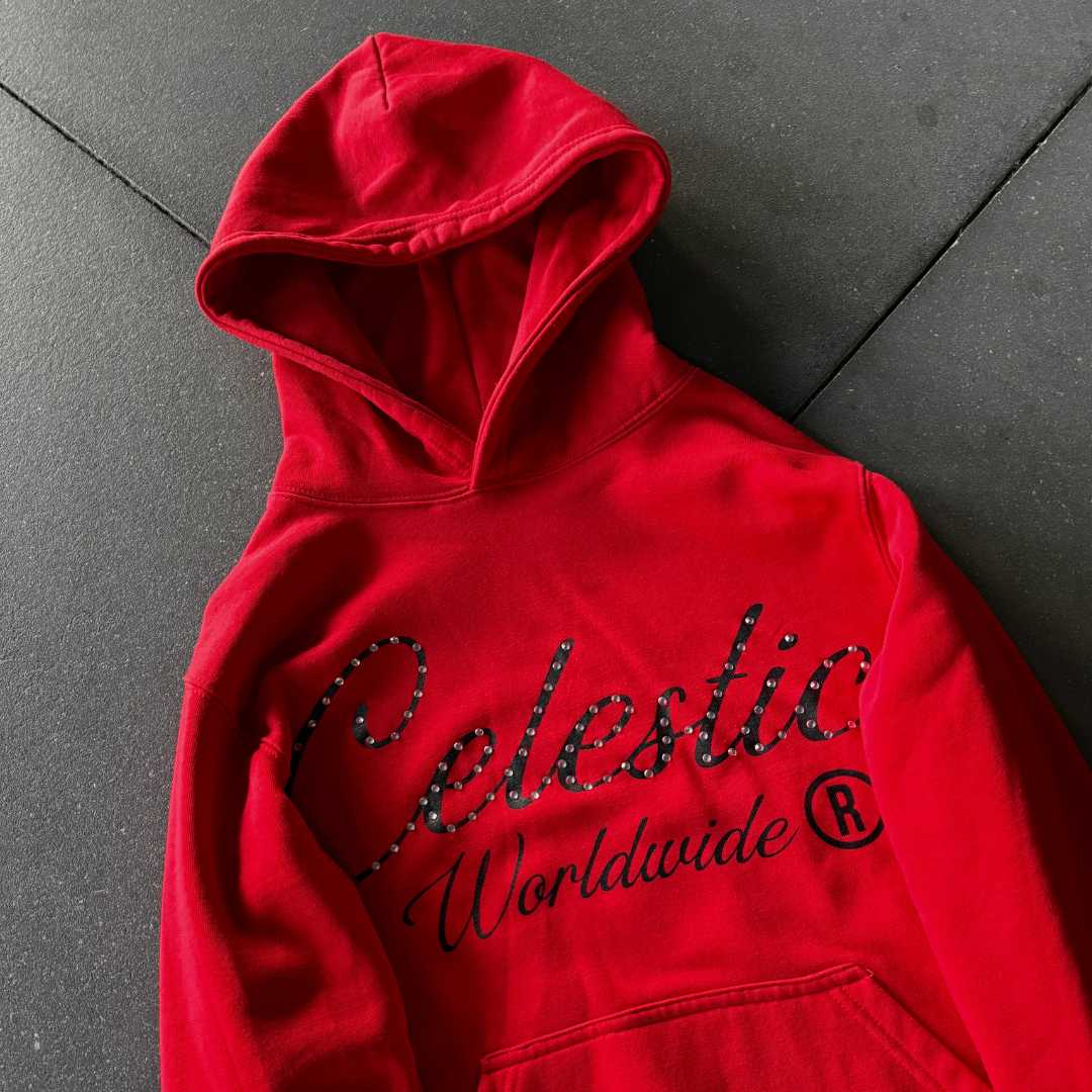 Close-up of premium 450 GSM heavy red cotton fleece material and structured hood