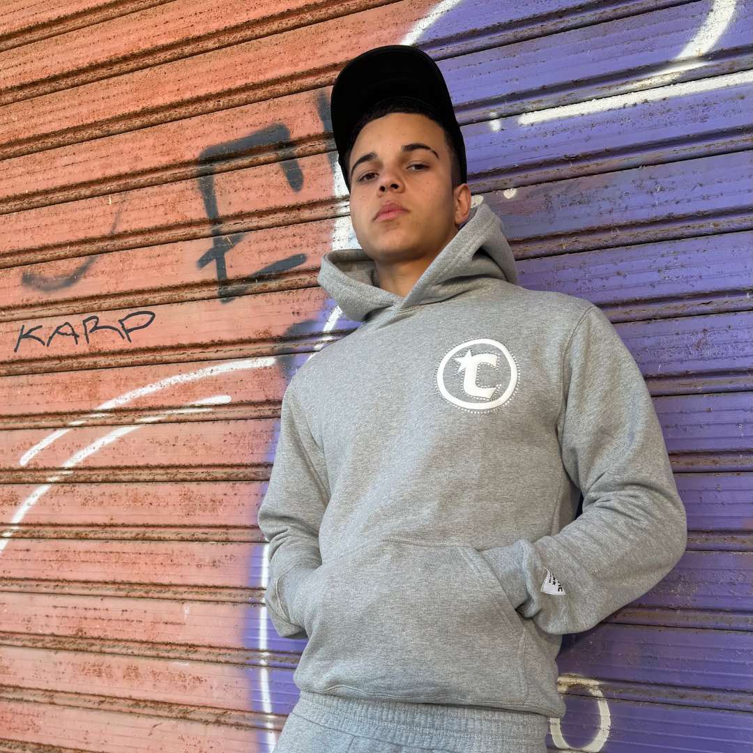Unisex relaxed oversized fit of the Grey Star Hoodie