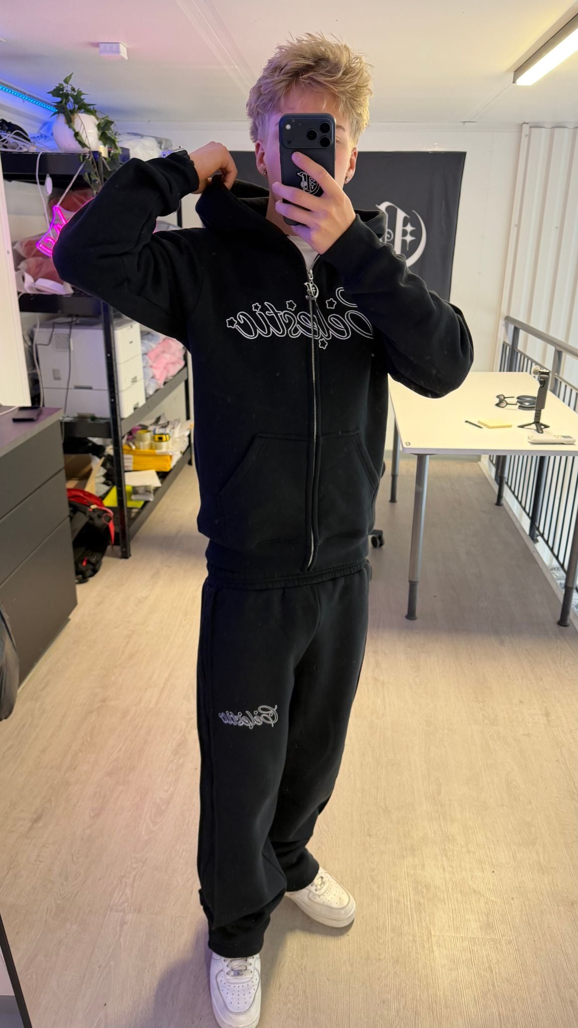 Unisex oversized fit of the Black Outline Hoodie