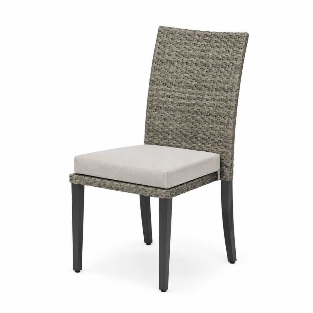 Silla de ratán sintético y aluminio con cojín de algodón