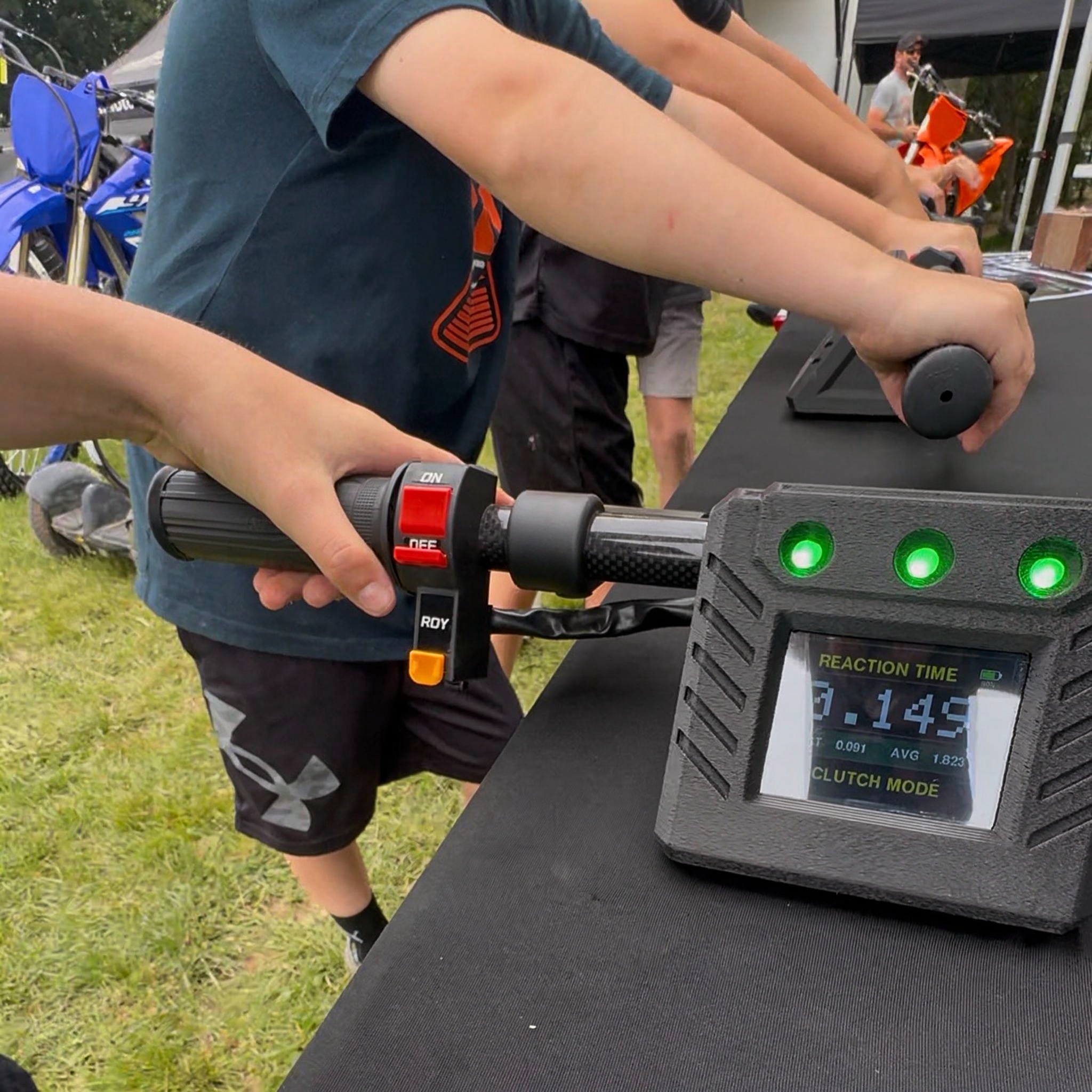 Riders testing the Holeshot Trainer outdoors