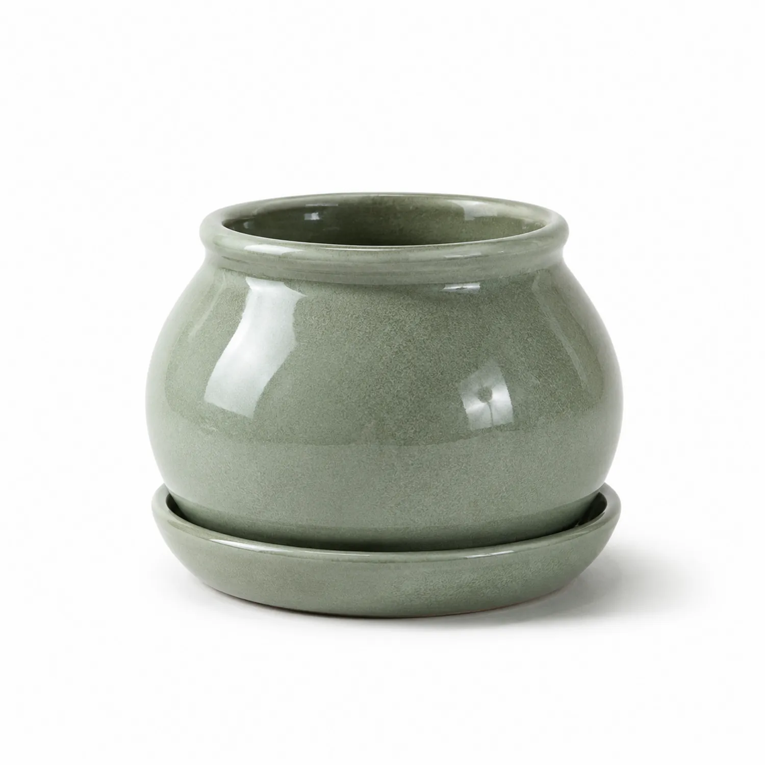 Zielona okrągła doniczka ceramiczna z podstawką