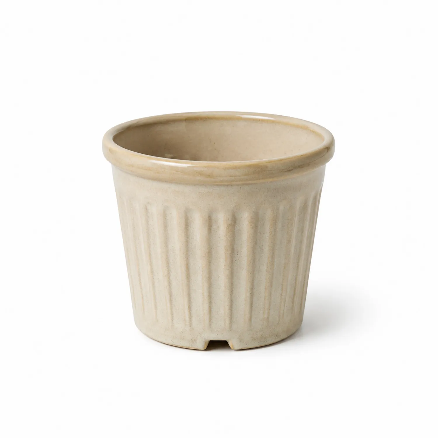 Beżowa żłobkowana doniczka ceramiczna z otworem odpływowym