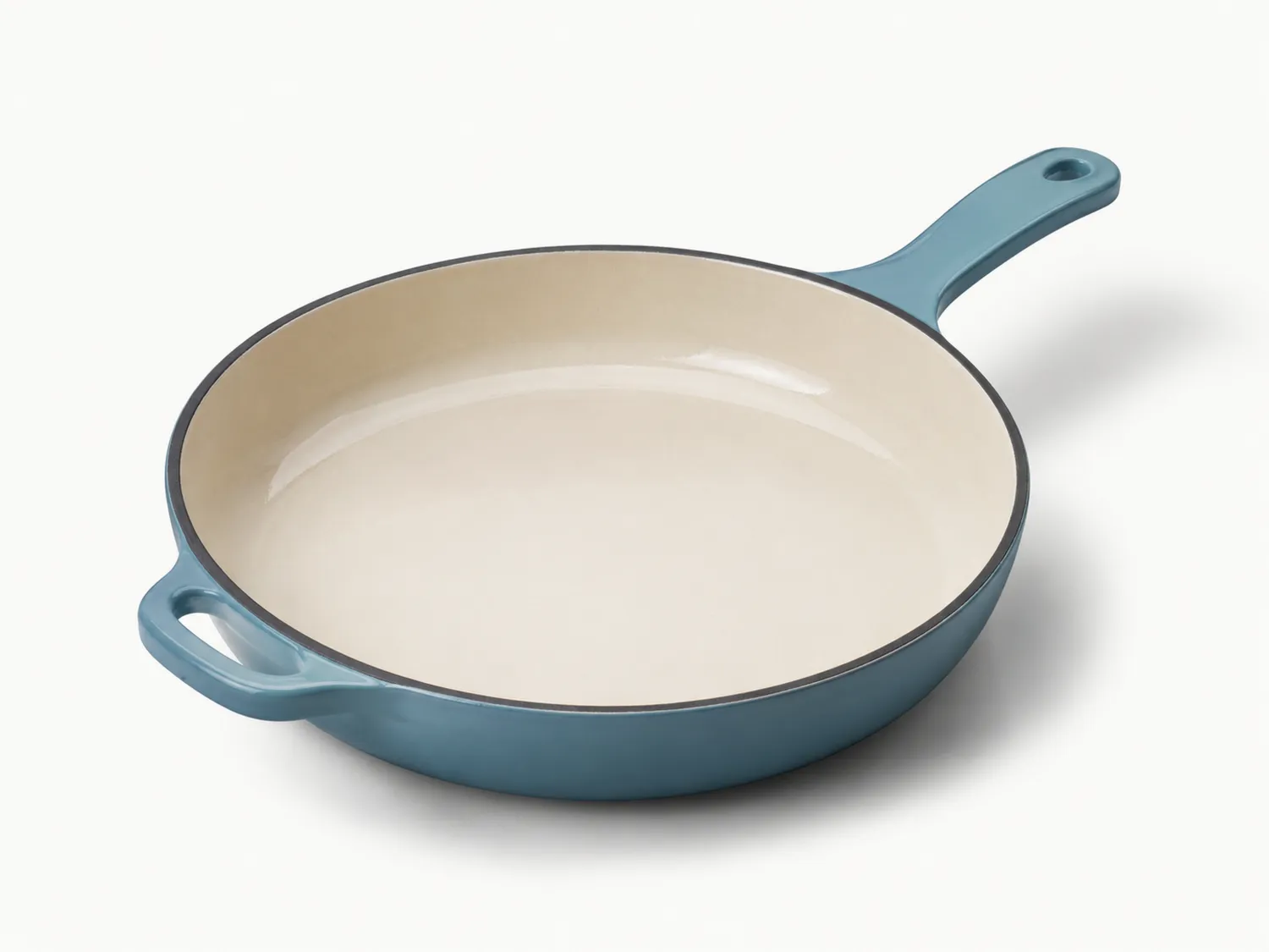 Blaue Gusseisenpfanne mit Emaille-Beschichtung