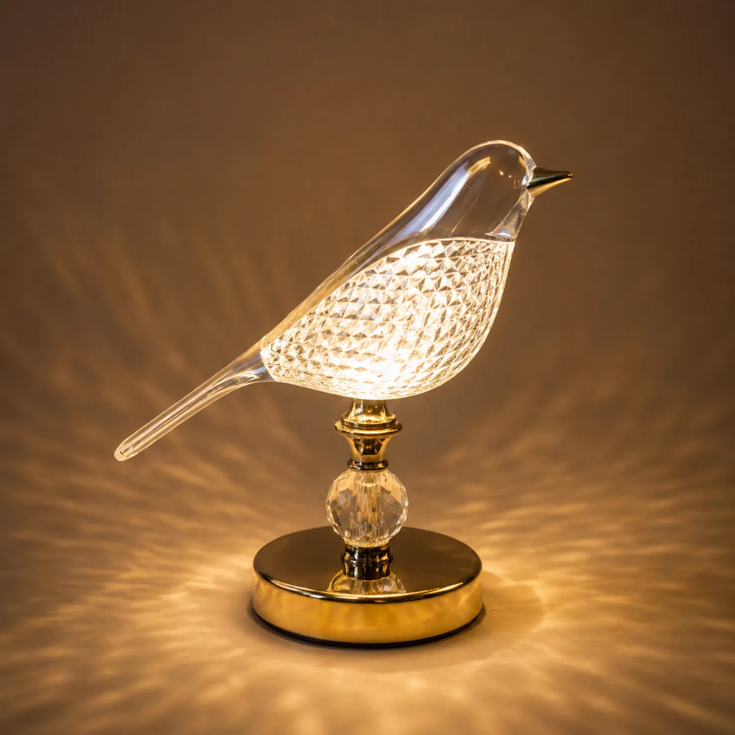 Lampe de table oiseau avec base dorée