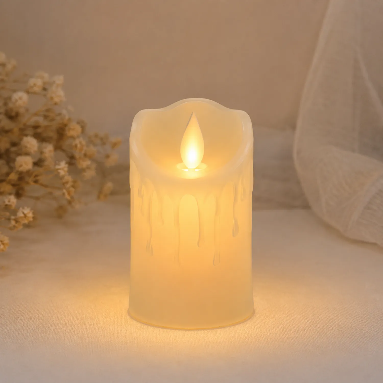 Bougie LED décorative ivoire à piles avec effet de cire