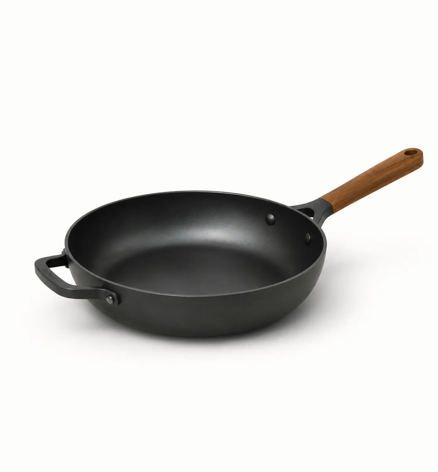 Poêle en fonte noire avec manche en bois