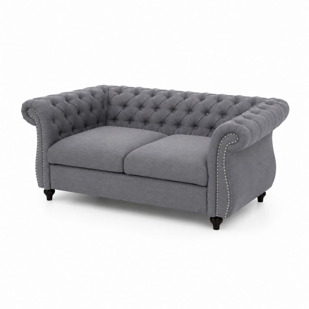 Divano Chesterfield in tessuto con gambe in legno