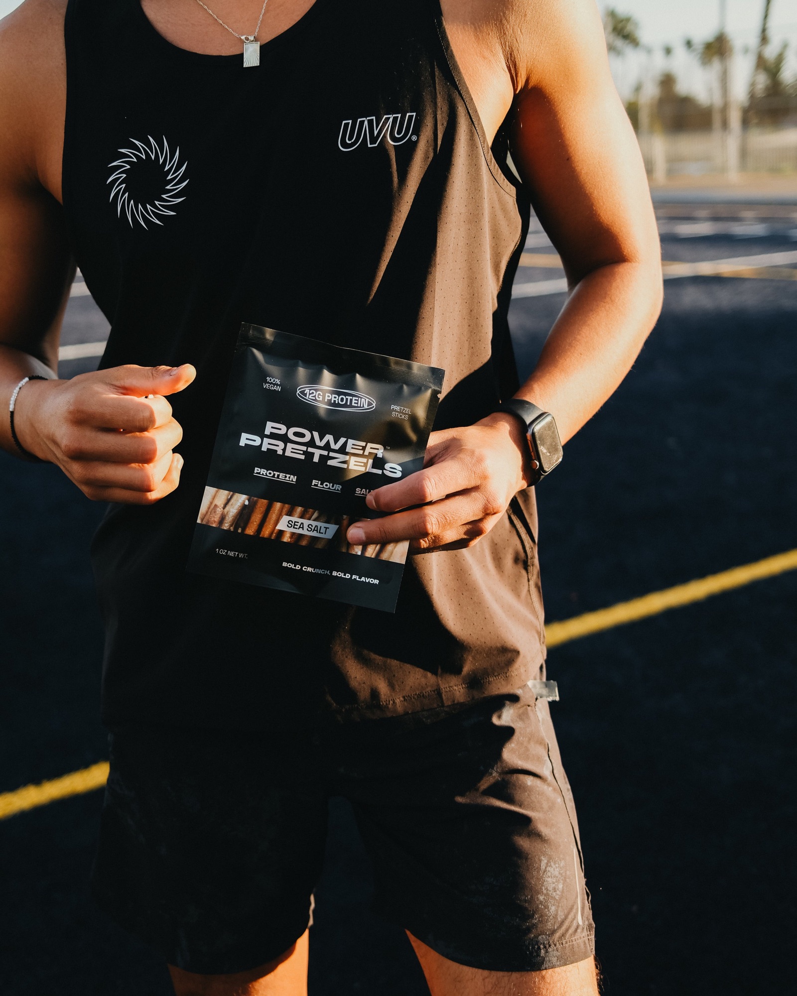 Athlete holding a bag of Power Pretzels